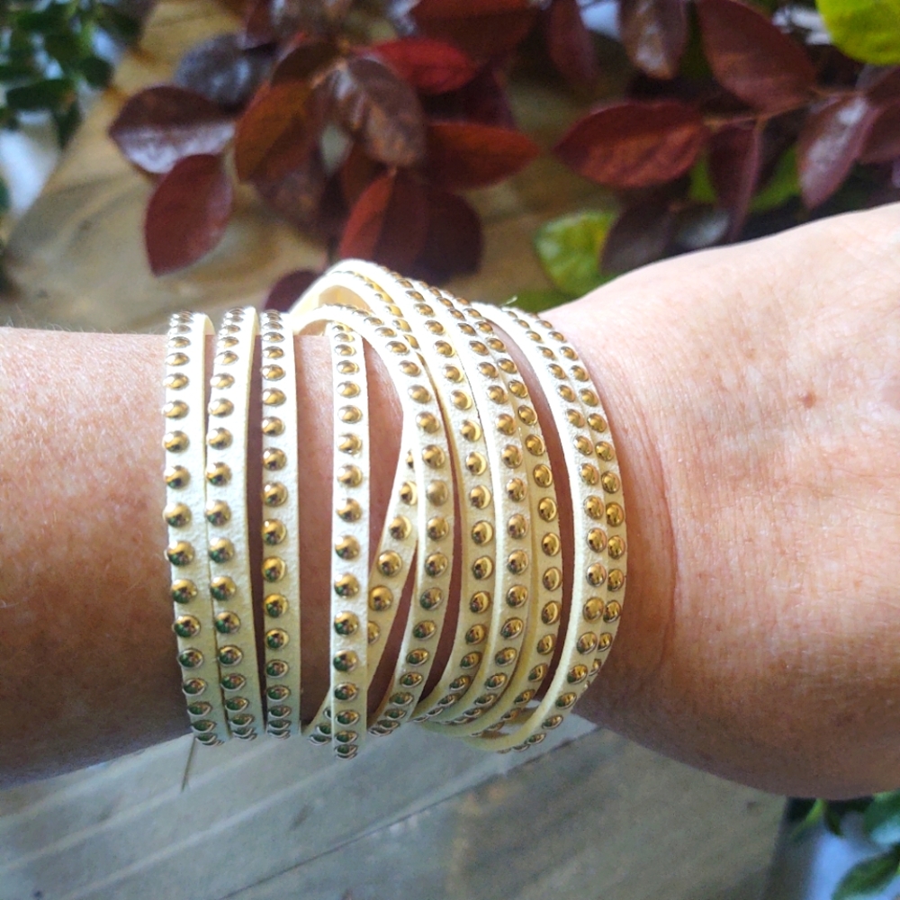 ENVY metal studded leatherette wrap bracelet, cream colored.